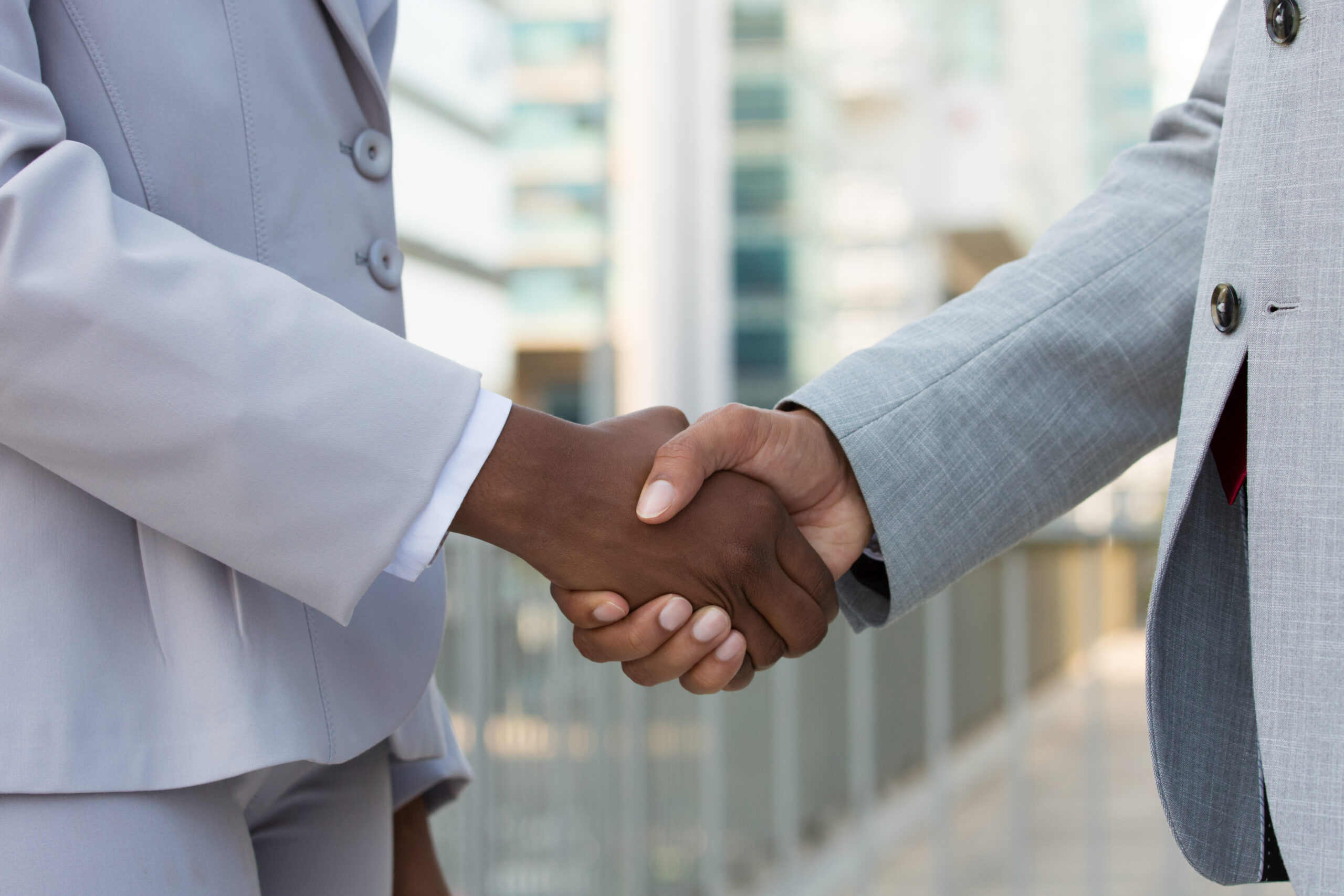 Mastering the First Impression: Your intriguing post title goes here Multiethnic Leaders Greeting Each Other City Scaled